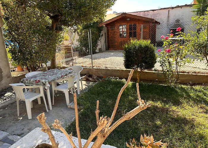 къща с четири спални двор с барбекю Дом отдыха *